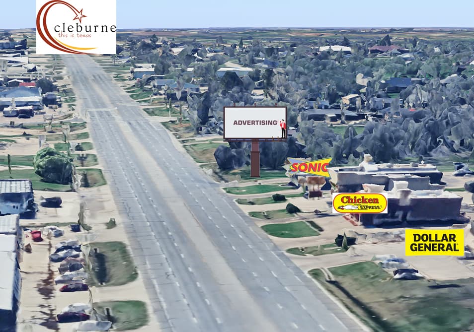 Close-up drone view of the digital billboard showing City of Joshua display with Sonic restaurant nearby